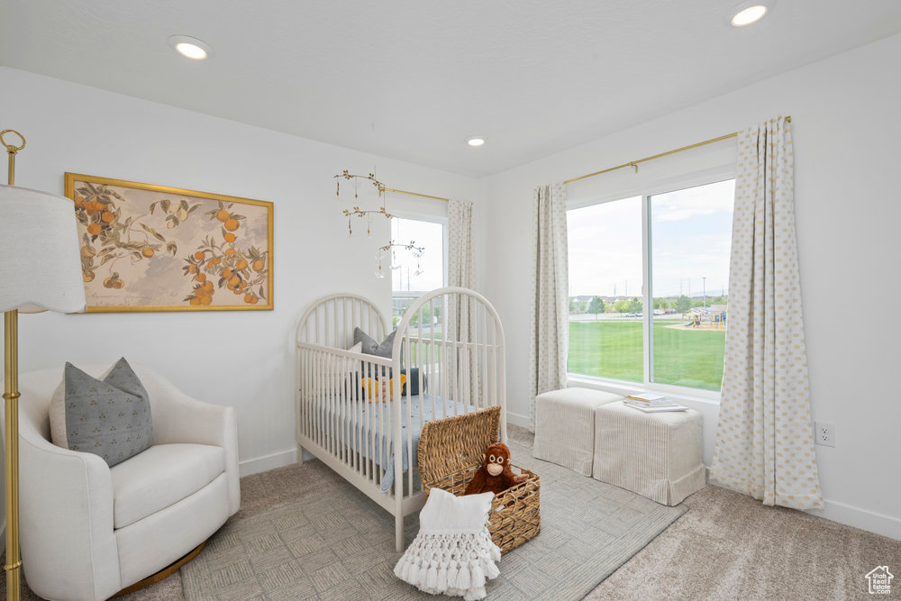 Bedroom with baseboards, carpet flooring, and recessed lighting