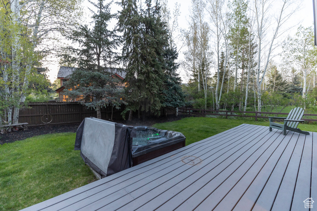 Deck featuring a hot tub