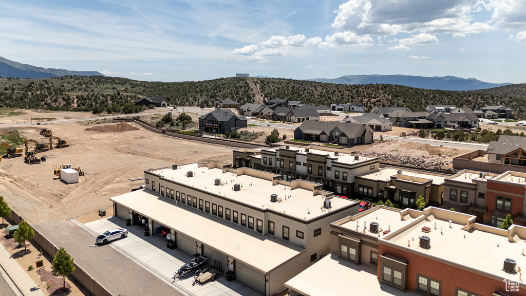 Aerial view of residential area with a mountainous background