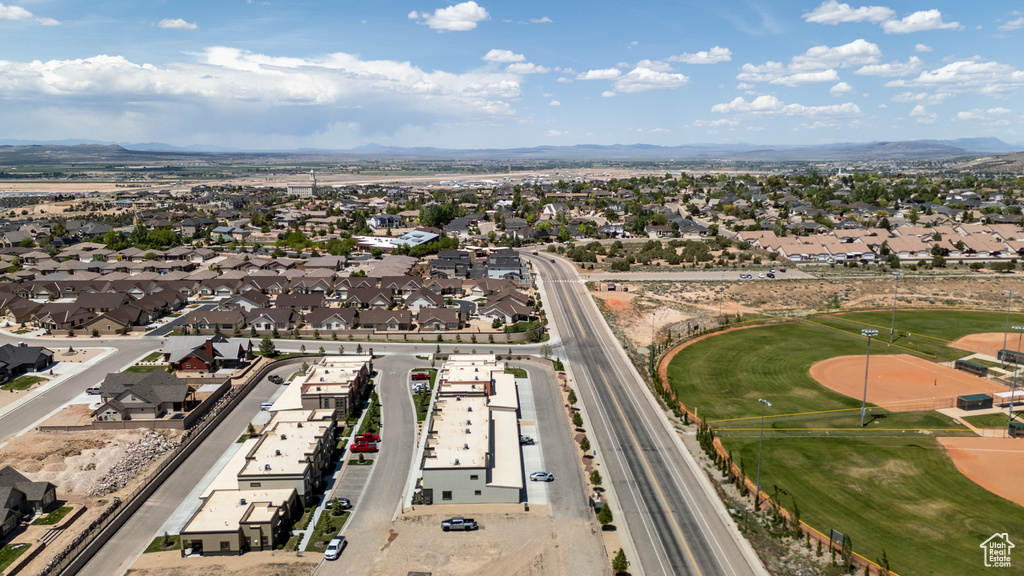 Aerial view of residential area featuring mountains