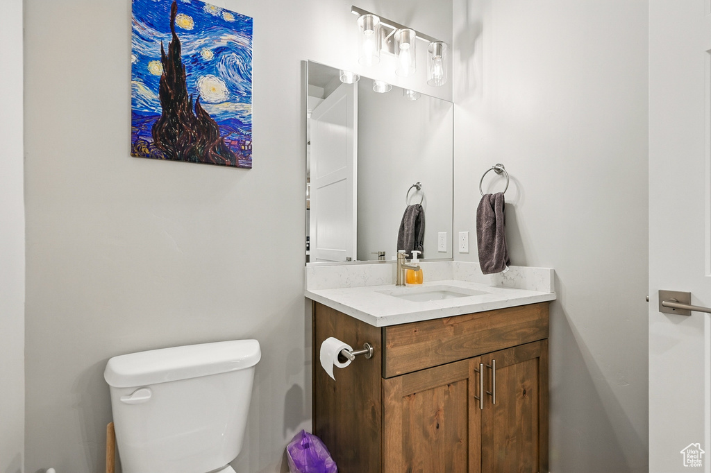 Bathroom featuring toilet and vanity