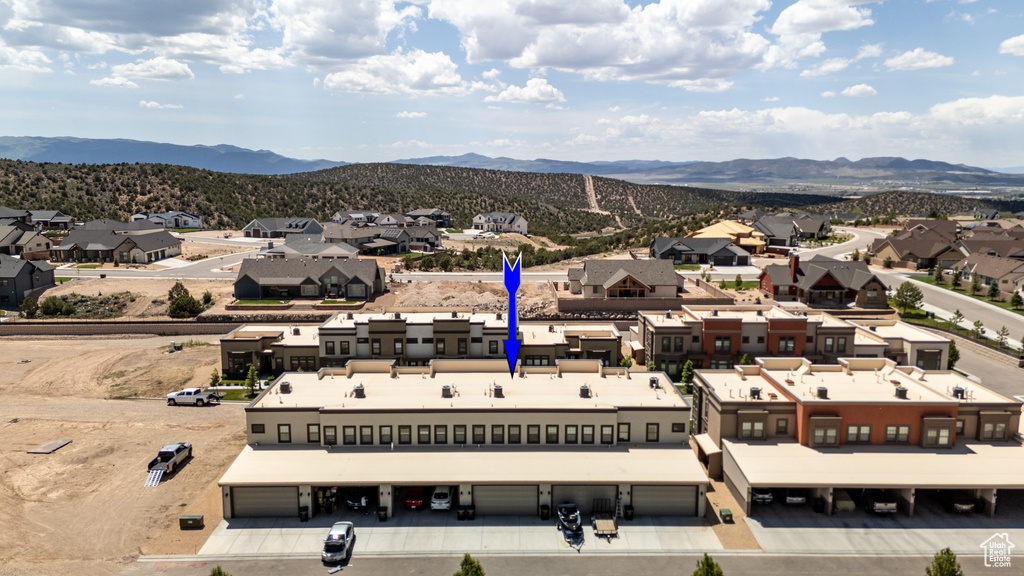 Aerial perspective of suburban area with mountains