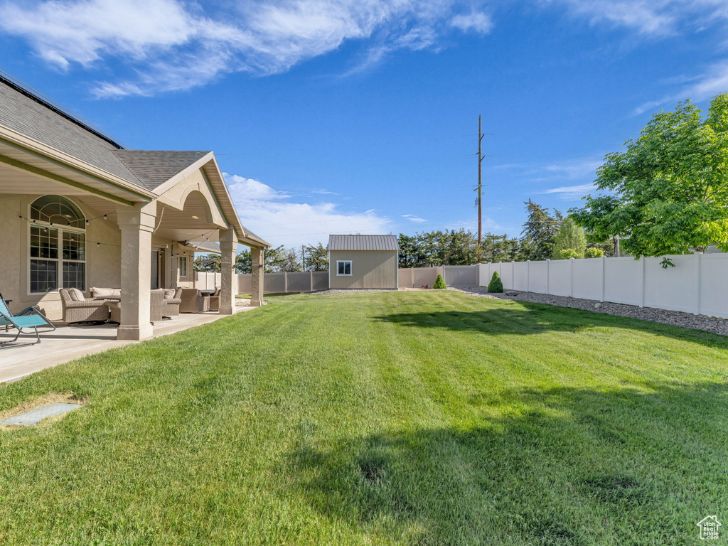 View of yard featuring an outdoor living space and a patio
