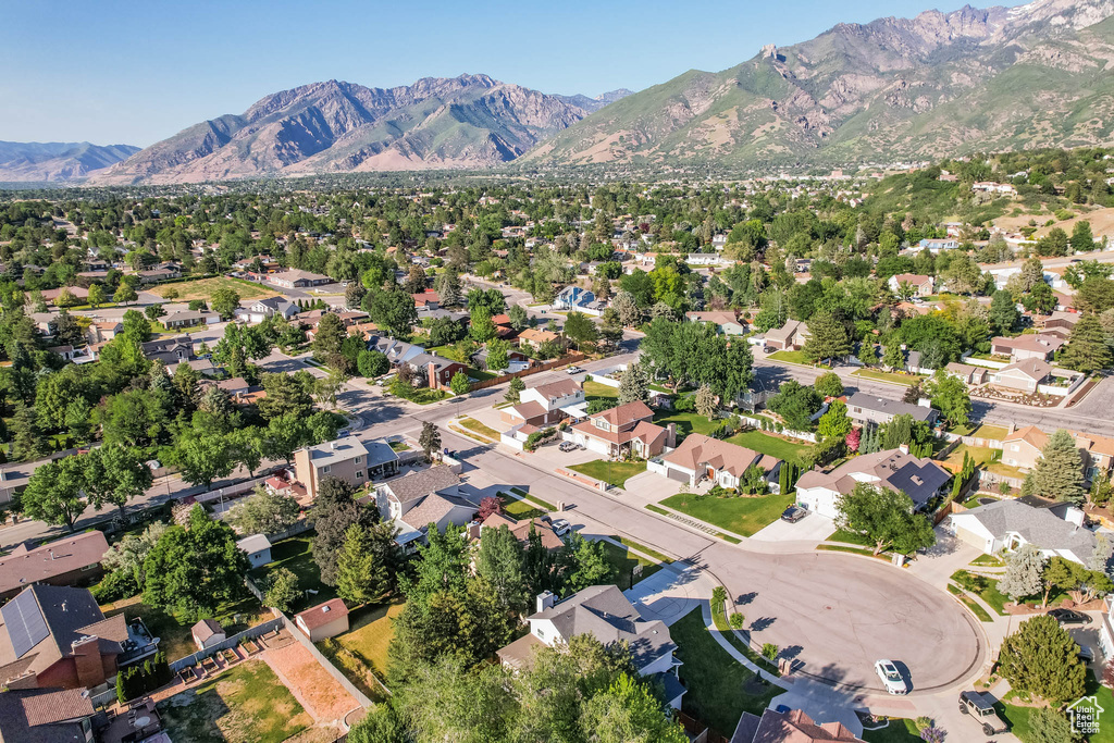 View of property location featuring nearby suburban area and a mountainous background