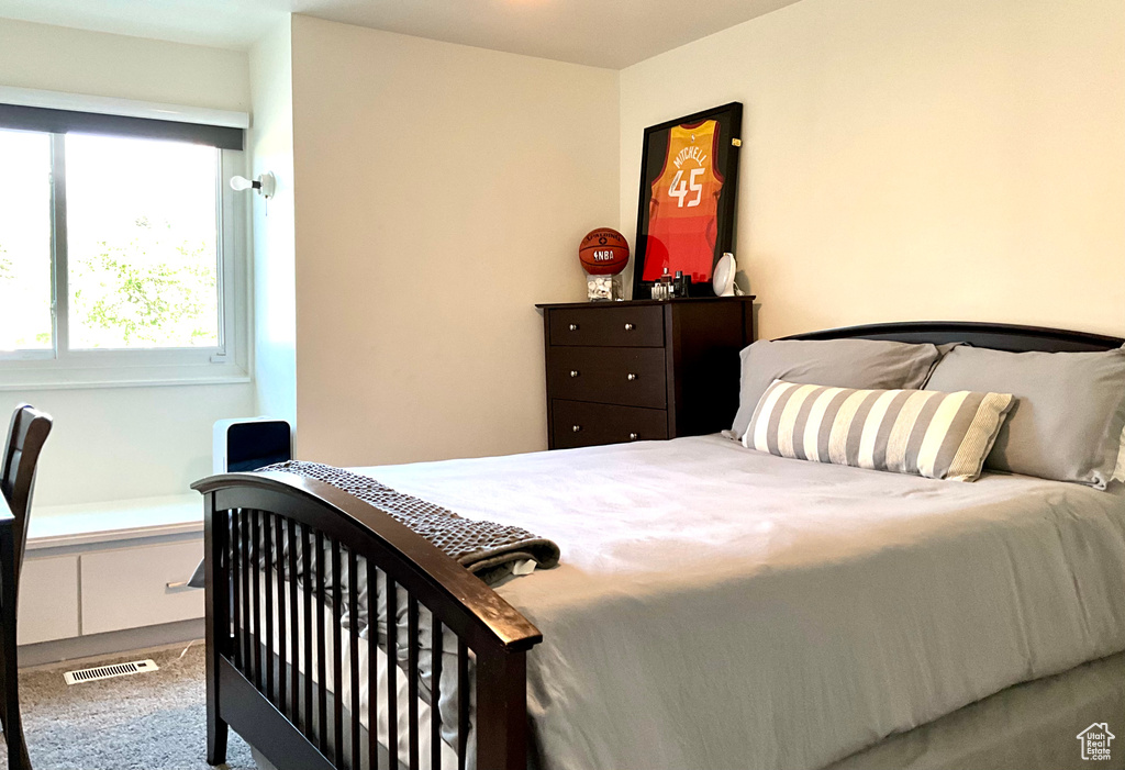 Bedroom featuring carpet flooring