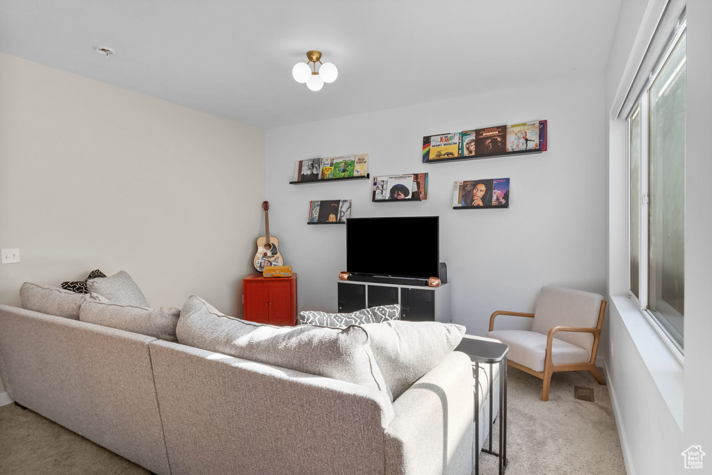 Living room with carpet and baseboards