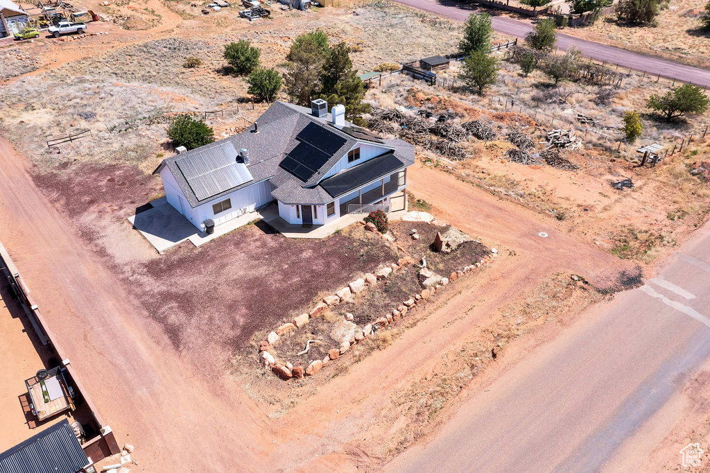 View of subject property featuring a desert landscape