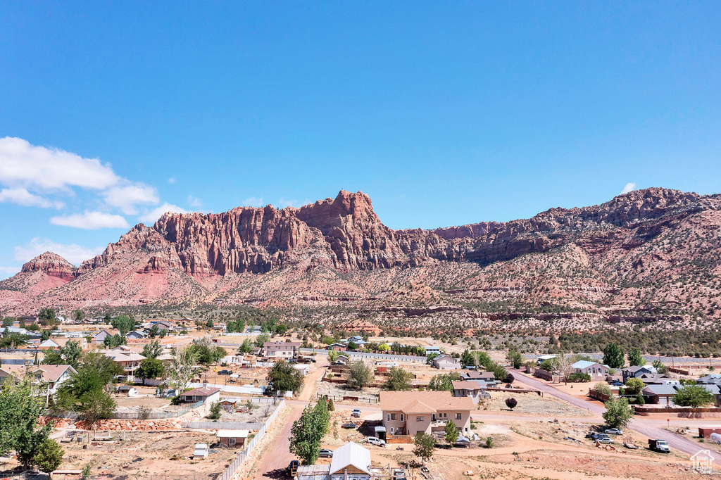 View of mountain background featuring nearby suburban area
