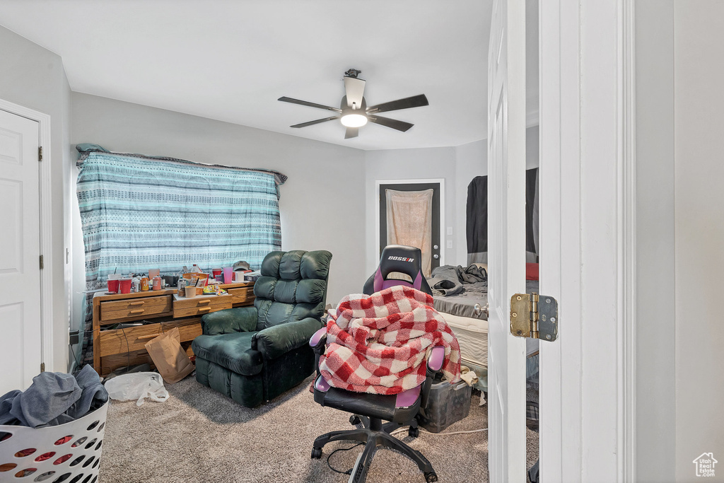Office space featuring carpet flooring and ceiling fan