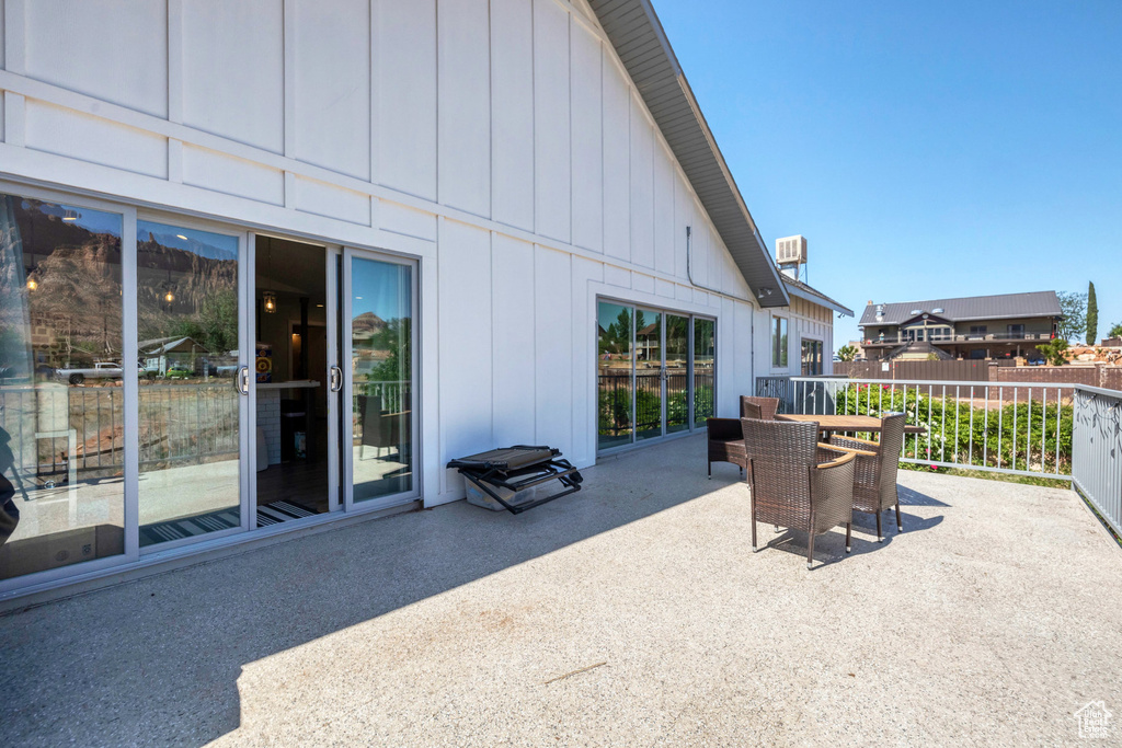 View of patio with outdoor dining space