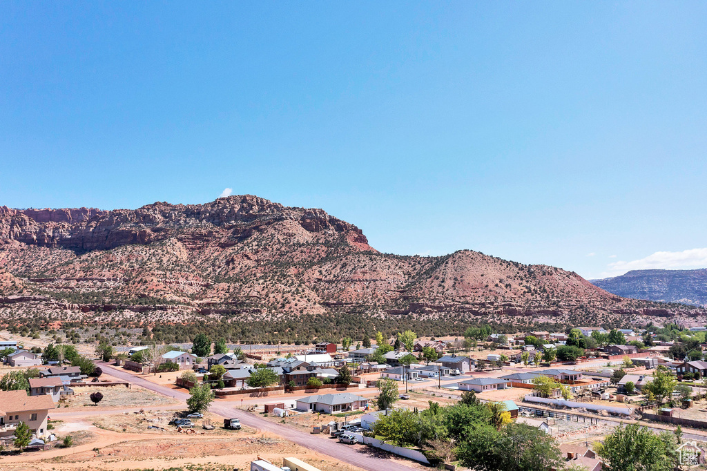 View of mountain background featuring nearby suburban area