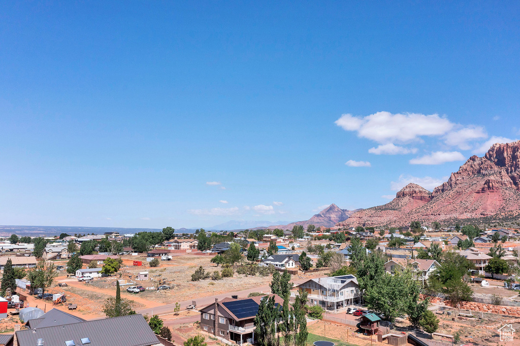 View of mountain backdrop with nearby suburban area