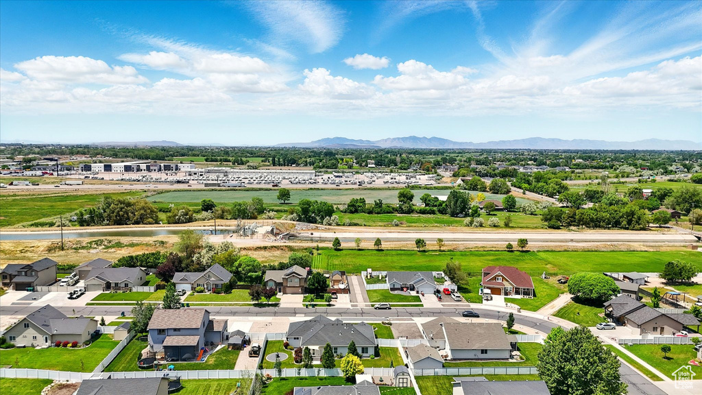 Aerial perspective of suburban area featuring a water and mountain view