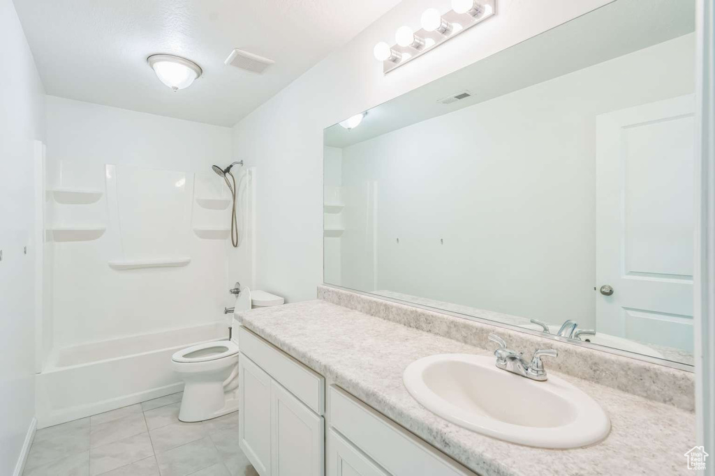Full bathroom with vanity and shower / washtub combination