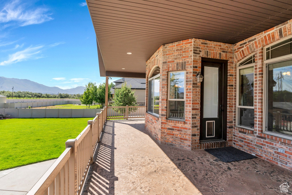 View of patio / terrace with a mountain view