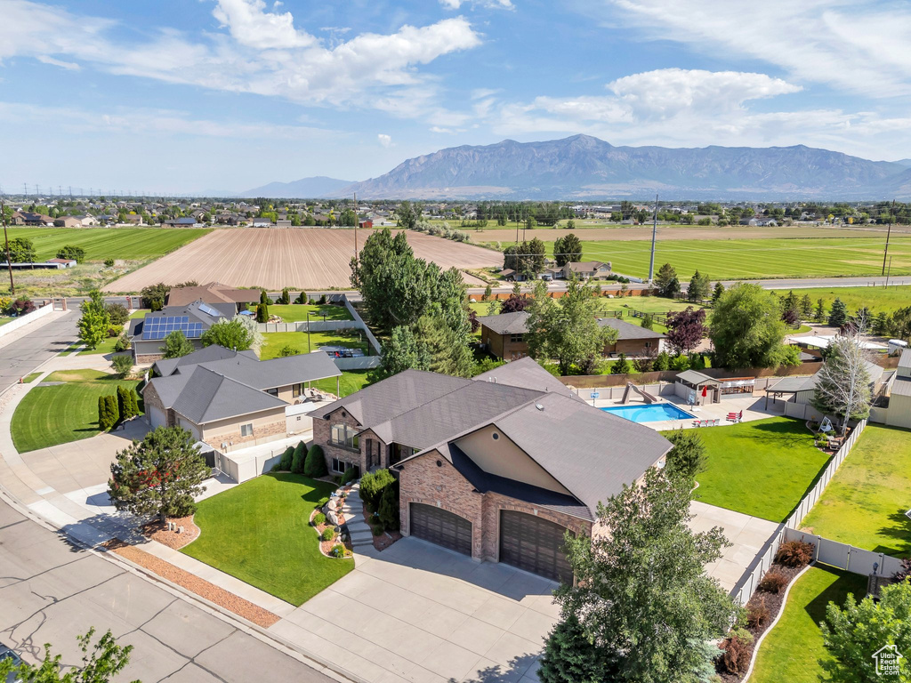 Drone / aerial view of mountains and a pool area