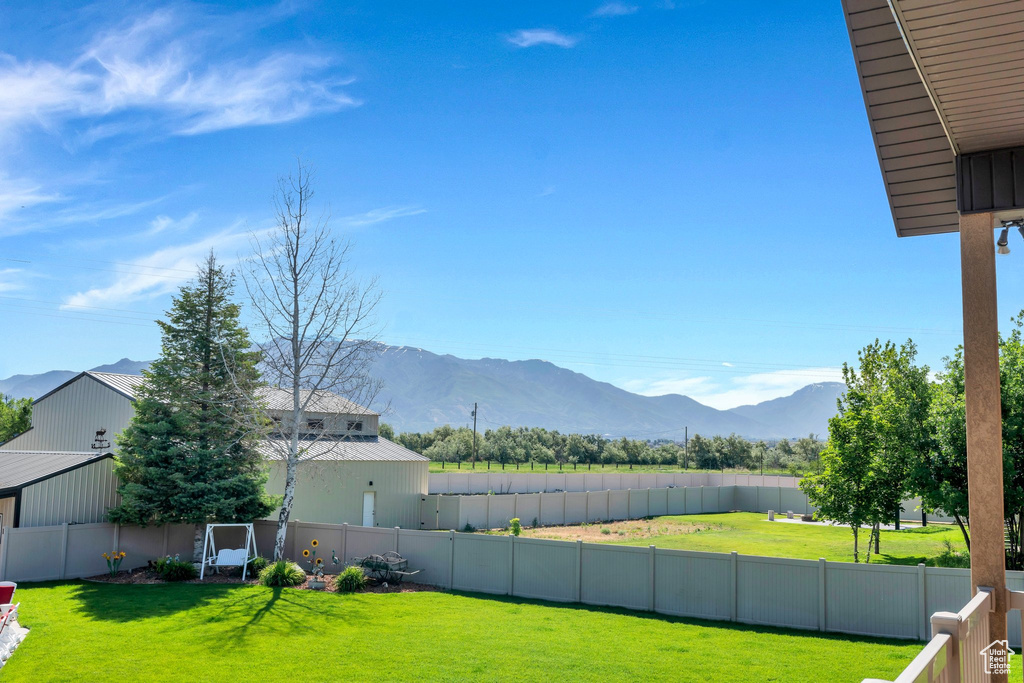View of yard with a mountain view