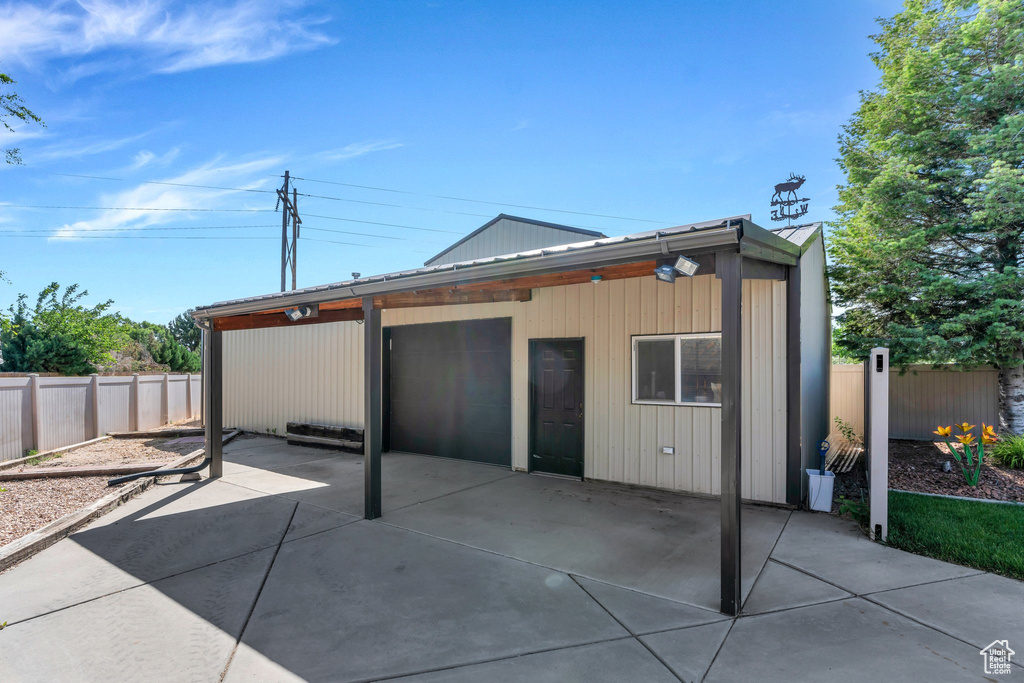 Back of property featuring a patio area