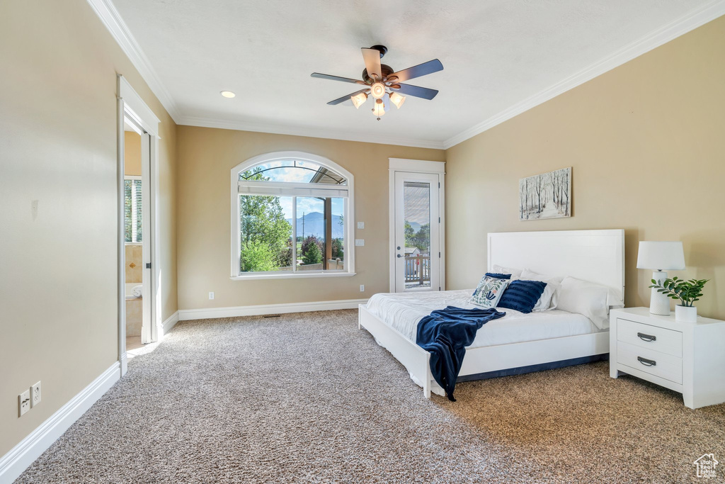 Bedroom with access to exterior, ornamental molding, light carpet, baseboards, and a ceiling fan
