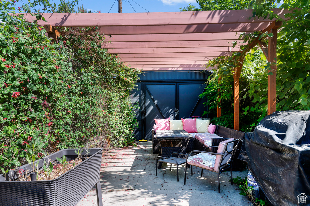 View of patio with a pergola