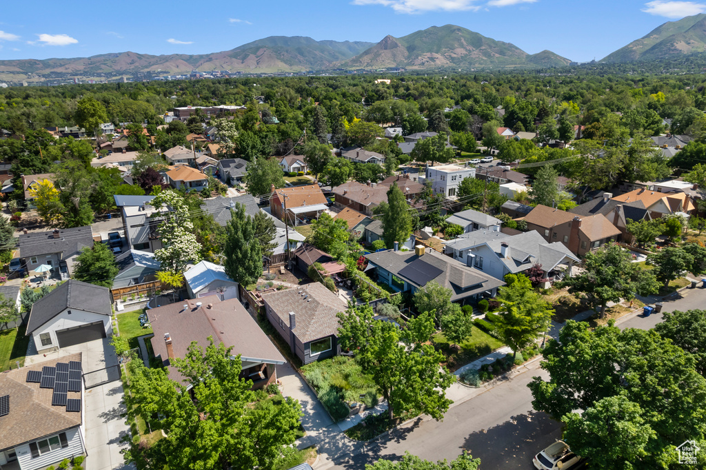Aerial view of residential area with a mountainous background