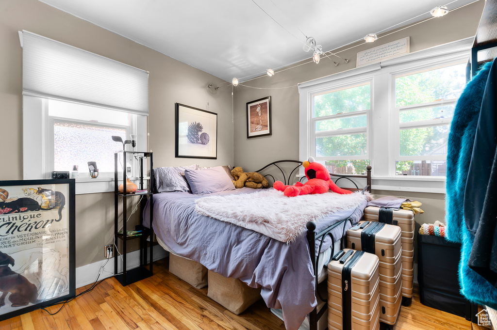 Bedroom featuring wood finished floors