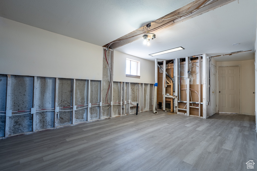 Below grade area with wood finished floors