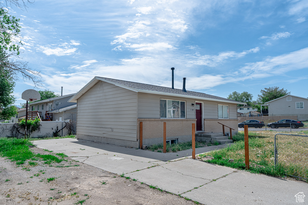 View of front of property with brick siding