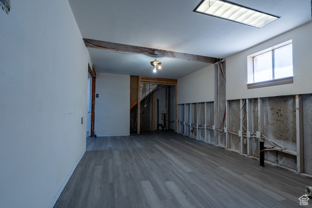 Below grade area featuring wood finished floors