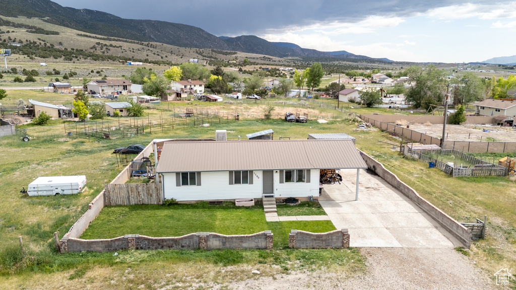 View of subject property with mountains