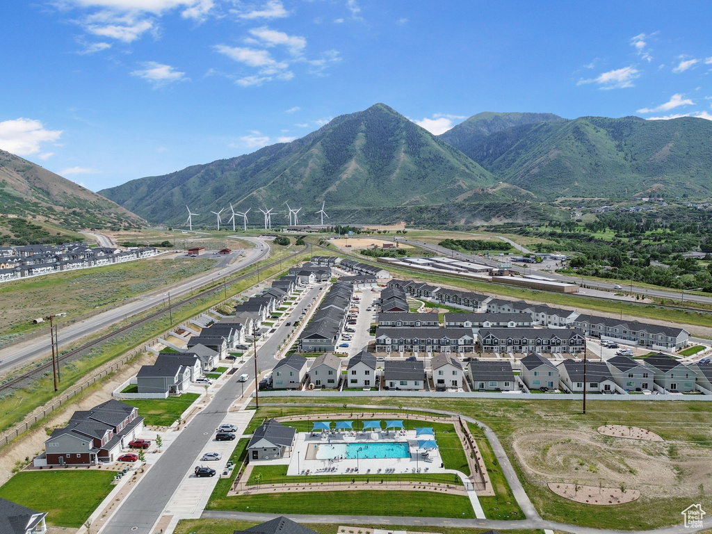 Aerial view of a pool area and mountains