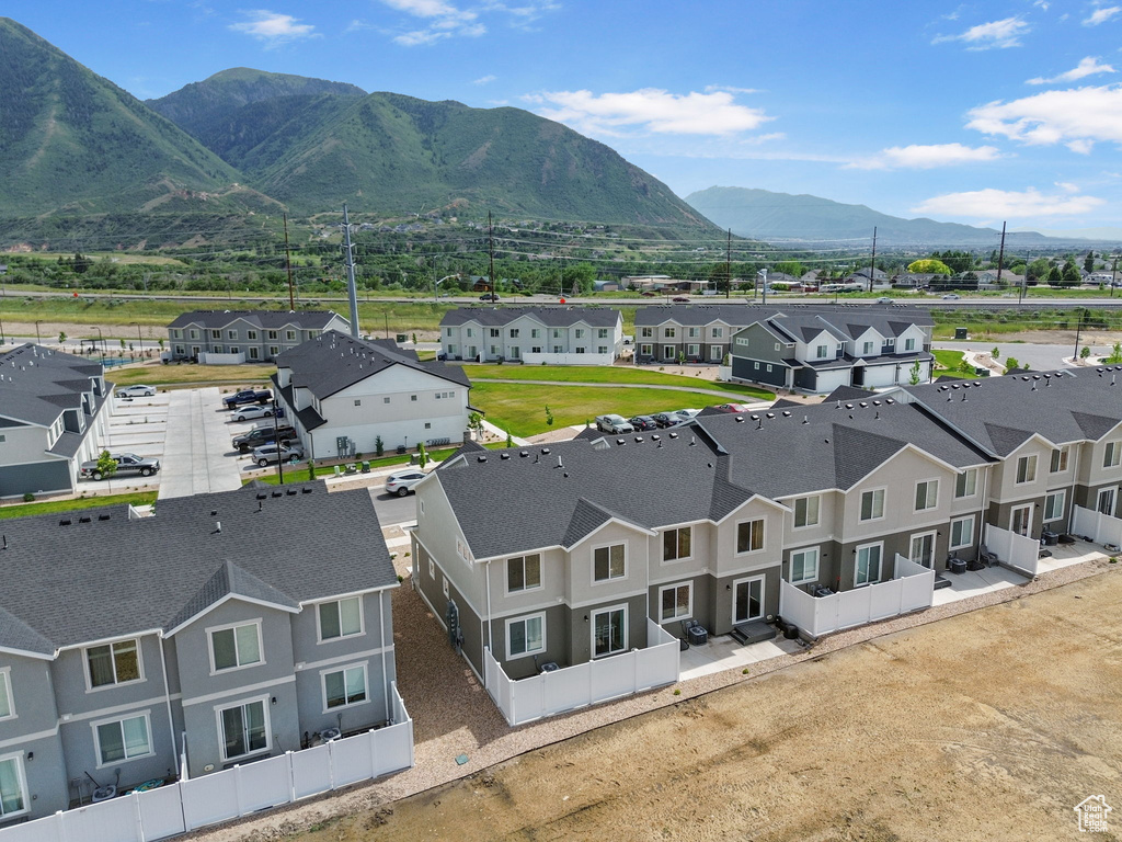 Aerial view of residential area with a mountain backdrop