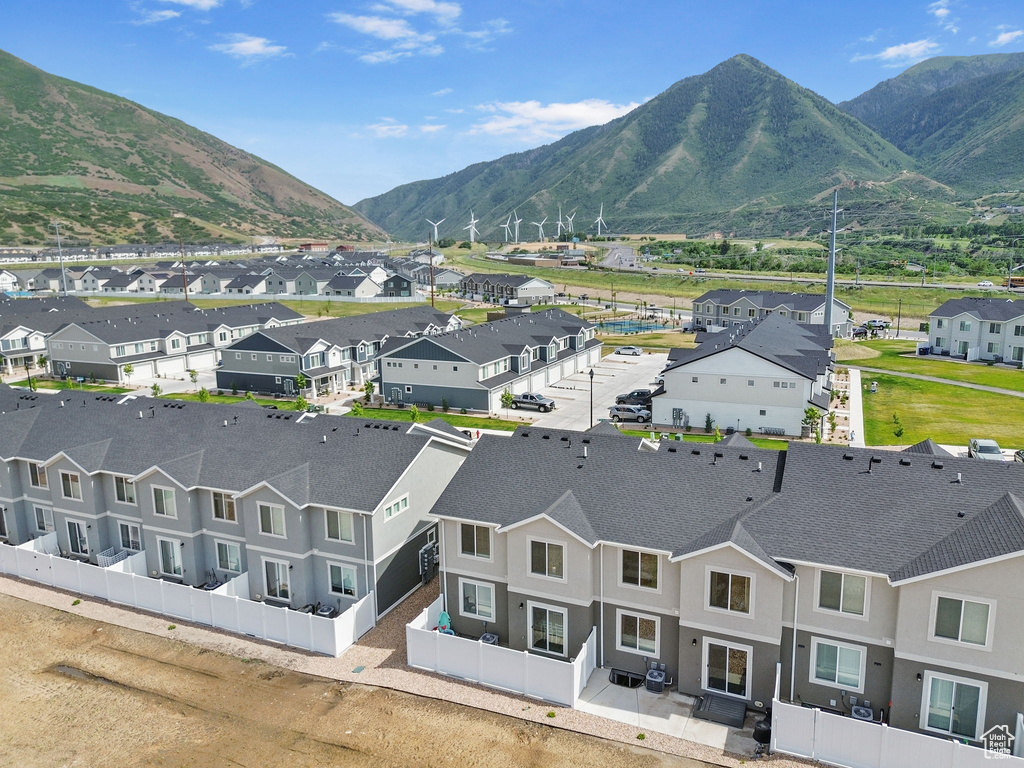 Aerial view of residential area with a mountain backdrop