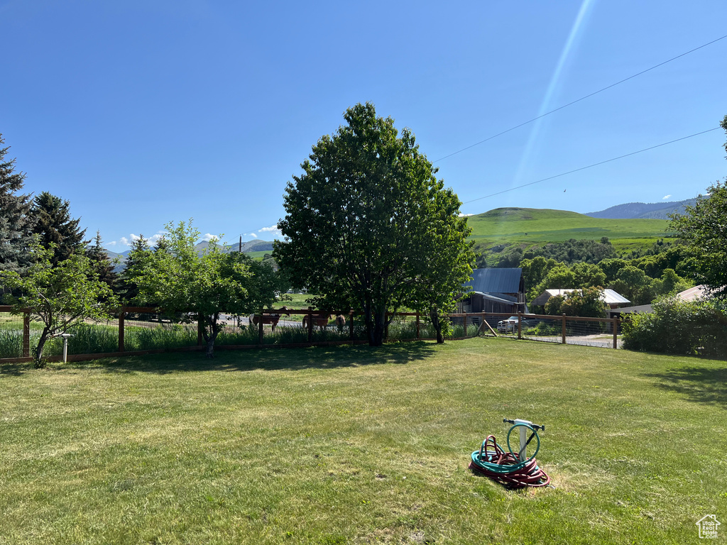View of yard with a mountain view