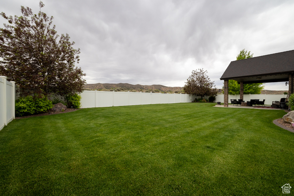 View of yard with a patio area