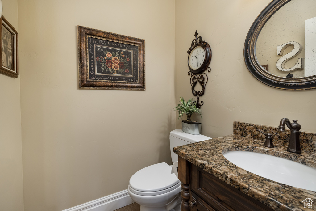 Bathroom with vanity and toilet