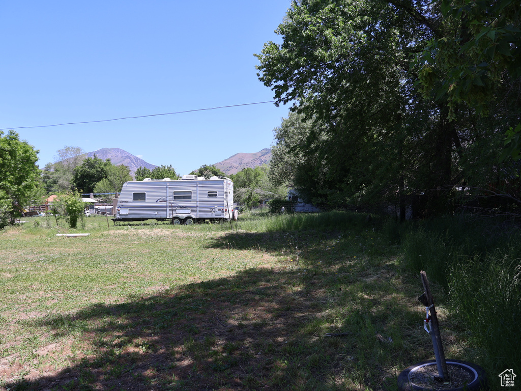 View of yard with a mountain view