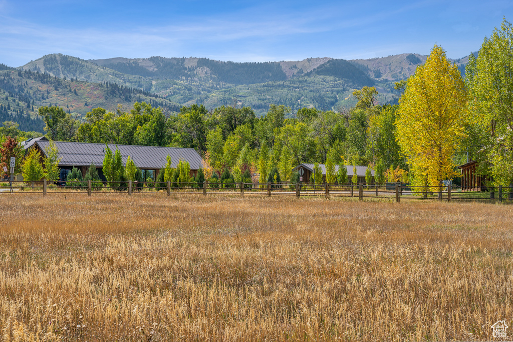 View of mountain backdrop featuring rural landscape