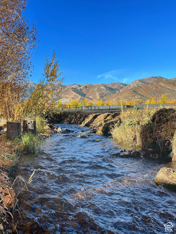 Water view with a mountainous background