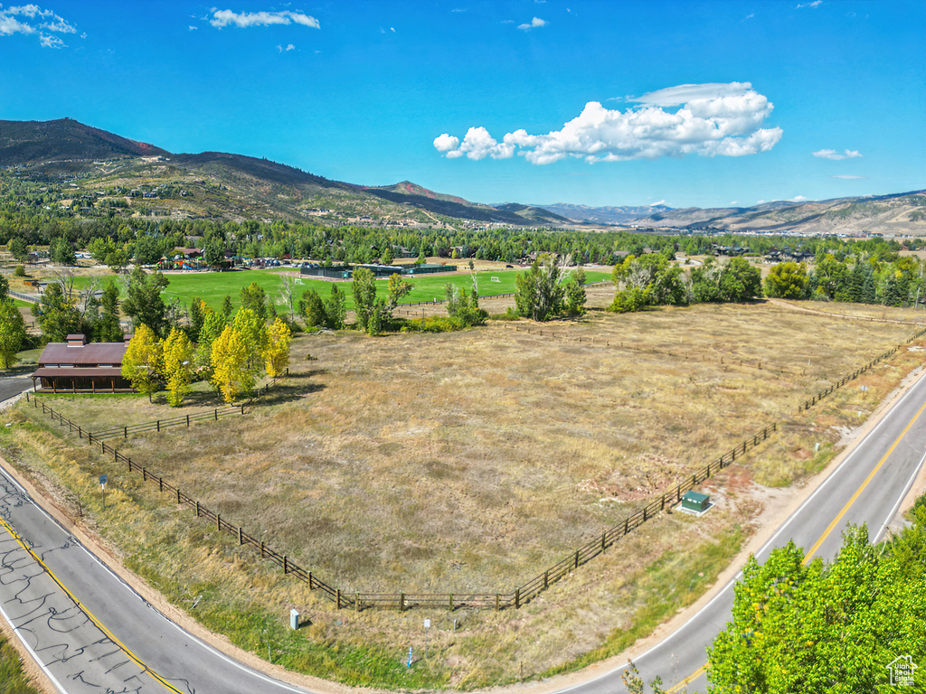 View of mountain background featuring rural landscape