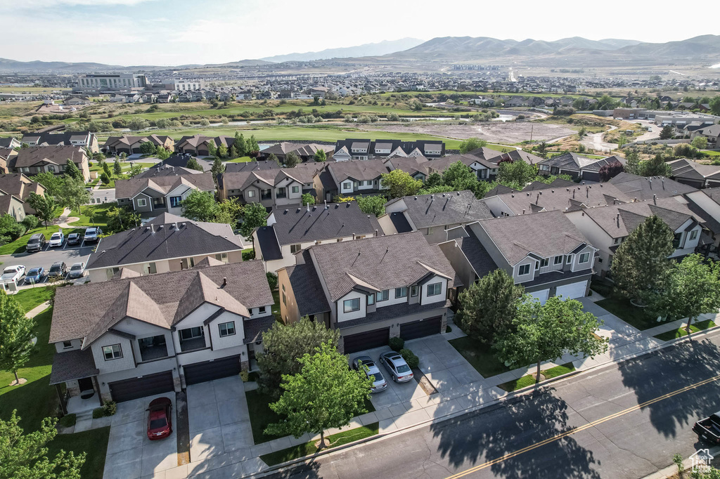 Aerial view of residential area with a mountainous background