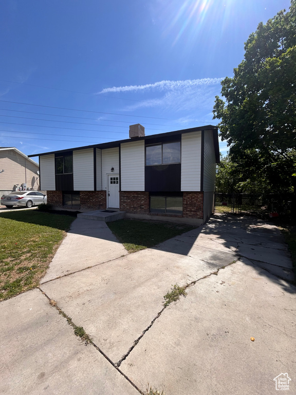 Bi-level home with brick siding