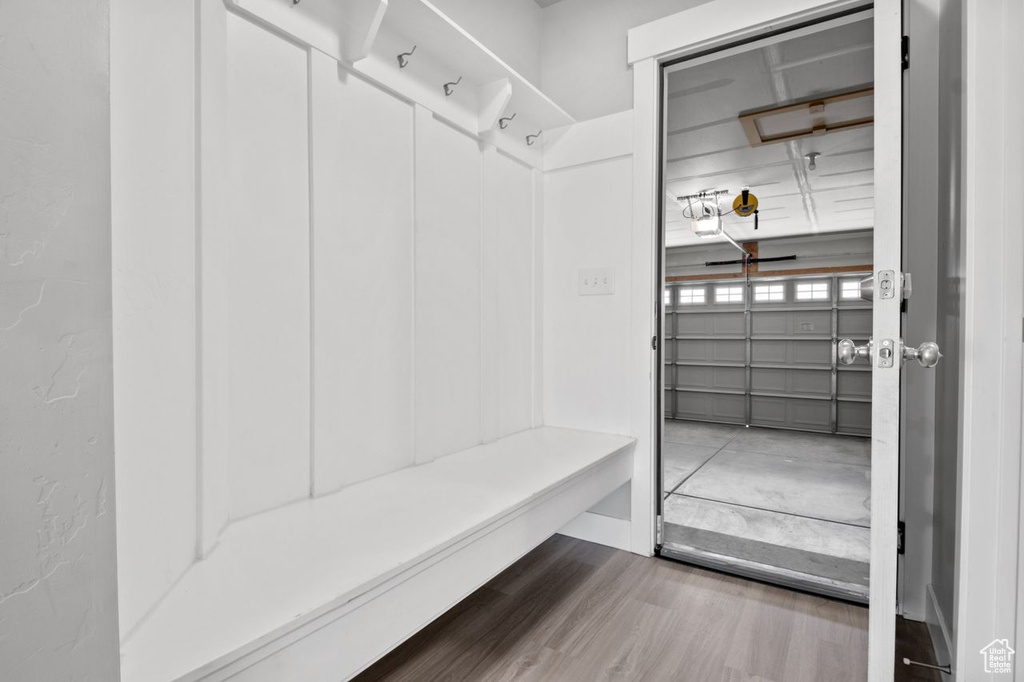 Mudroom with wood finished floors
