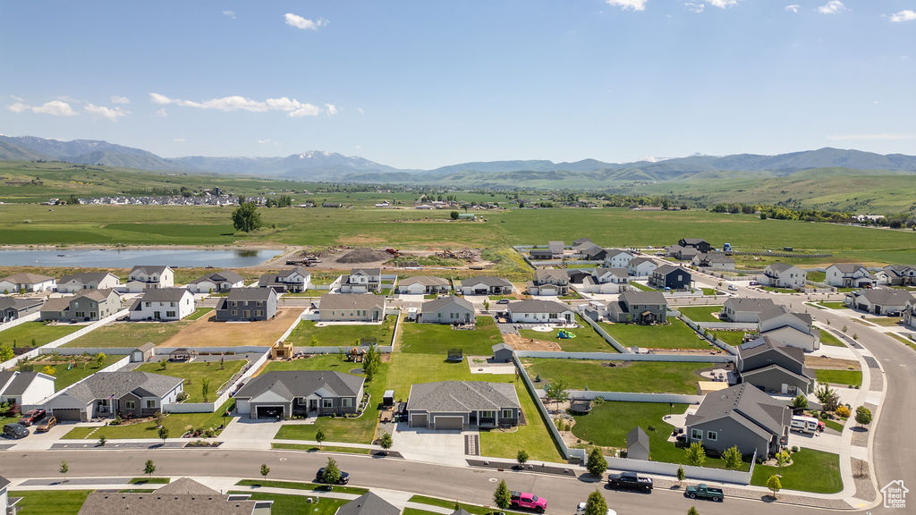 Aerial view of residential area with a water and mountain view
