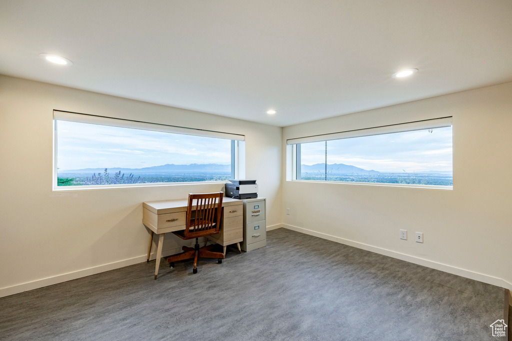 Home office with recessed lighting, baseboards, and a mountain view