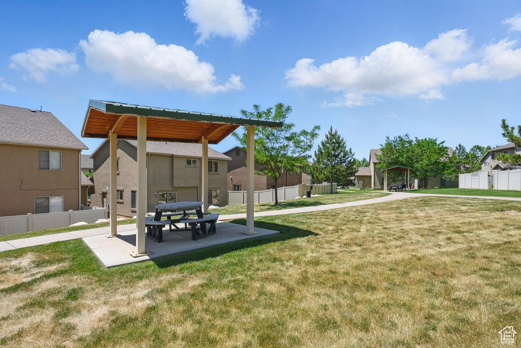 View of yard with a gazebo, a patio area, and a residential view