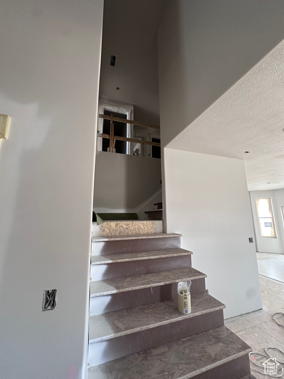 Stairway with a textured ceiling