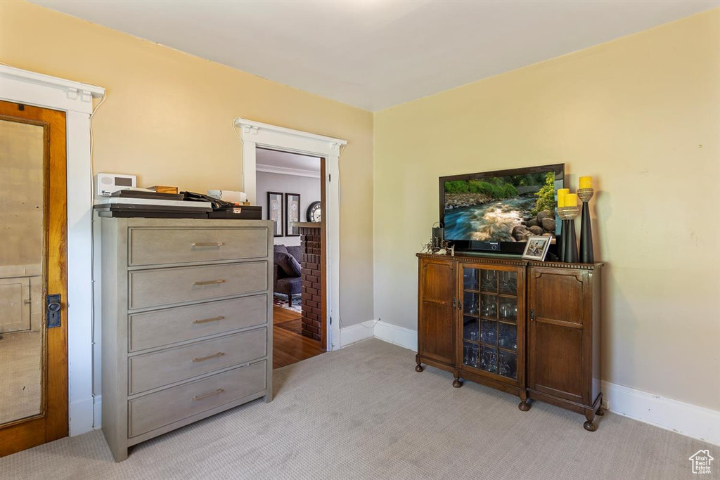Bedroom with carpet and baseboards