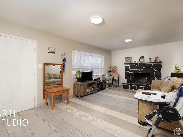 Living room featuring a fireplace