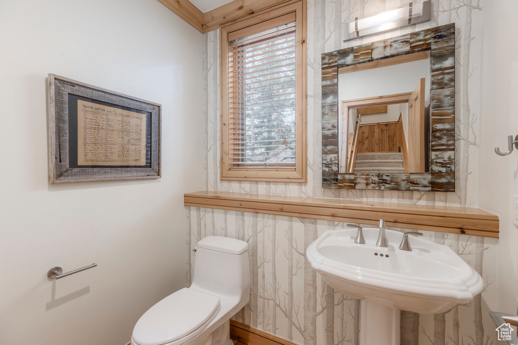 Bathroom with toilet and a sink